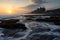 Beautiful sunset at Tanah Lot, landmark of Bali island, Bali, Indonesia