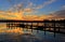 Beautiful sunset and timber jetty silhouette