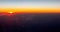 Beautiful sunset view from an airplane over land