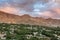 Beautiful sunset view of Leh city and green Indus valley with Tsemo Maitreya temple on the top of the hill