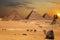 Beautiful sunset view on the Sphinx and the Pyramids of Giza, desert scenery with camels