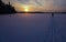 Beautiful sunset in winter with skier Lapland, Finland