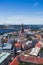 Beautiful super wide-angle panoramic aerial view of Riga, Latvia with harbor and skyline with scenery beyond the city