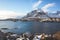 Beautiful super wide-angle winter snowy view of fishing village A, Norway, Lofoten Islands, with skyline, mountains, famous fishin
