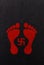 Beautiful Swastika sign and lakshmi footprints decorated with kumkum on black background. diwali concept