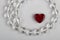 Beautiful symbol of love - heart and crystal beads