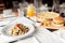 Beautiful table of italian pasta, pizza, burger and drinks. selective focus