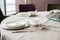 Beautiful table setting with china porcelain and chopsticks eating utensils