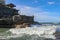 Beautiful Tanah Lot Temple in Bali Indonesia epic scene - nature and architecture background. Pilgrimage Temple of Pura Tanah Lot