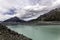 Beautiful Tasman Glacier and turqouise lake with surrounding high mountains of the Mount Cook National Park, New Zea