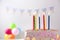 Beautiful tasty birthday cake with candles on blurred background