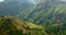 Beautiful tea plantation landscape of green valleys under morning sun. Sri Lanka Aerial of Little Adam`s peak, Ella, Sri