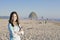 Beautiful teen girl on beach near Haystack Rock