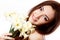 Beautiful teen girl smiling and with flower narcissus