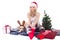 Beautiful teenage girl with dog in reindeer horns and christmas