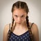 Beautiful Teenage Girl With Plaits and Onesie