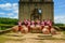 Beautiful teenage girls dancing to show tourists