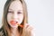 Beautiful teenager girl brushes her teeth large portrait