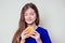 Beautiful teenager girl is eating baked vegetarian burger with vegetables. Child vegan idea healthy eating concept.clear