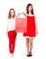 Beautiful teenagers holding shopping bag