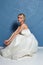Beautiful tender young woman sexy blond bride in a luxury white wedding dress lace chiffon Summer happiness awaits the groom