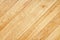 Beautiful texture of natural light oak planks arranged diagonally