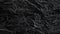 Beautiful, textured surface of black Silesian slate close-up