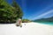 Beautiful Thailand travel island Koh Lipe white sand beach with heart bamboo sculpture landmark and blue sky landscape background
