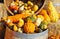 Beautiful Thanksgiving decoration concept. Decorative pumpkins and other vegetables with different shape and colors close up.