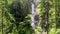The beautiful three-part Lower Martuljek Waterfall in the Julian Alps, Slovenia. Triglav National Park. Scenic mountain with