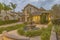 Beautiful tiered fountain at the garden of a home against sky with gray clouds