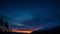 Beautiful time lapse of the nightfall at the mountains. Amazing sunset and sky