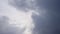 Beautiful time lapse video of dark blue storm cloud against pearly white silver sky. Rainclouds floating with wind