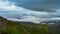 Beautiful timelapse in galicia, spain, with clouds moving over mountains in scenic valley at sunrise. scenic panoramic landscape