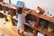 Beautiful toddler boy playing with figurine army soldiers at kindergarten