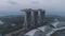 Beautiful top view of the famous Singapore Marina Bay Sands hotel. Shot. Three hight hotel towers and a swimming pool at