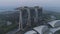 Beautiful top view of the famous Singapore Marina Bay Sands hotel. Shot. Three hight hotel towers and a swimming pool at