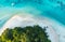 Beautiful top view of  the lagoon sand beach tropical with seashore as the island in a coral reef ,blue and turquoise sea Amazing