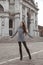 Beautiful tourist girl visiting famous landmark of Basilica Santa Maria della Salute, Venice, Italy