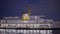 Beautiful tourist vessel glows at night. Action. Large tourist boat glows as it swims to shore. Trip on sea vessel along