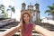 Beautiful tourist woman takes self portrait in the baroque colonial city of Ouro Preto, old capital of the state Minas Gerais,