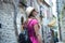 A beautiful touristic girl visiting the city of San Marino, travel and vacation