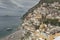 Beautiful town Positano with the leaving ship on the sea, Italy