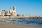 The beautiful town of Sitges with seagulls, Landscape of the coastline in Sitges, ParrÃ²quia de Sant Bartomeu i Santa