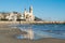 The beautiful town of Sitges with seagulls, Landscape of the coastline in Sitges, ParrÃ²quia de Sant Bartomeu i Santa