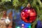Beautiful toys on the Christmas tree create a Christmas mood