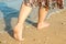 Beautiful traces with feet on sea nature background