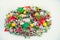 Beautiful traditional bright Christmas wreath decorated with pine cones, spruce branches,berries, balls, stars, decorative beers