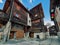 Beautiful traditional wooden houses in the streets of the alpine village Grimentz, Switzerland, in the canton Valais, municipality