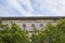 Beautiful treetops in spring against the background of an ancient building in Europe. Germany